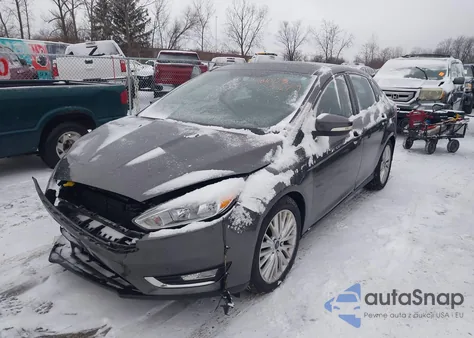 2015 Ford Focus Titanium из США, поврежденный, VIN 1FADP3J29FL247710